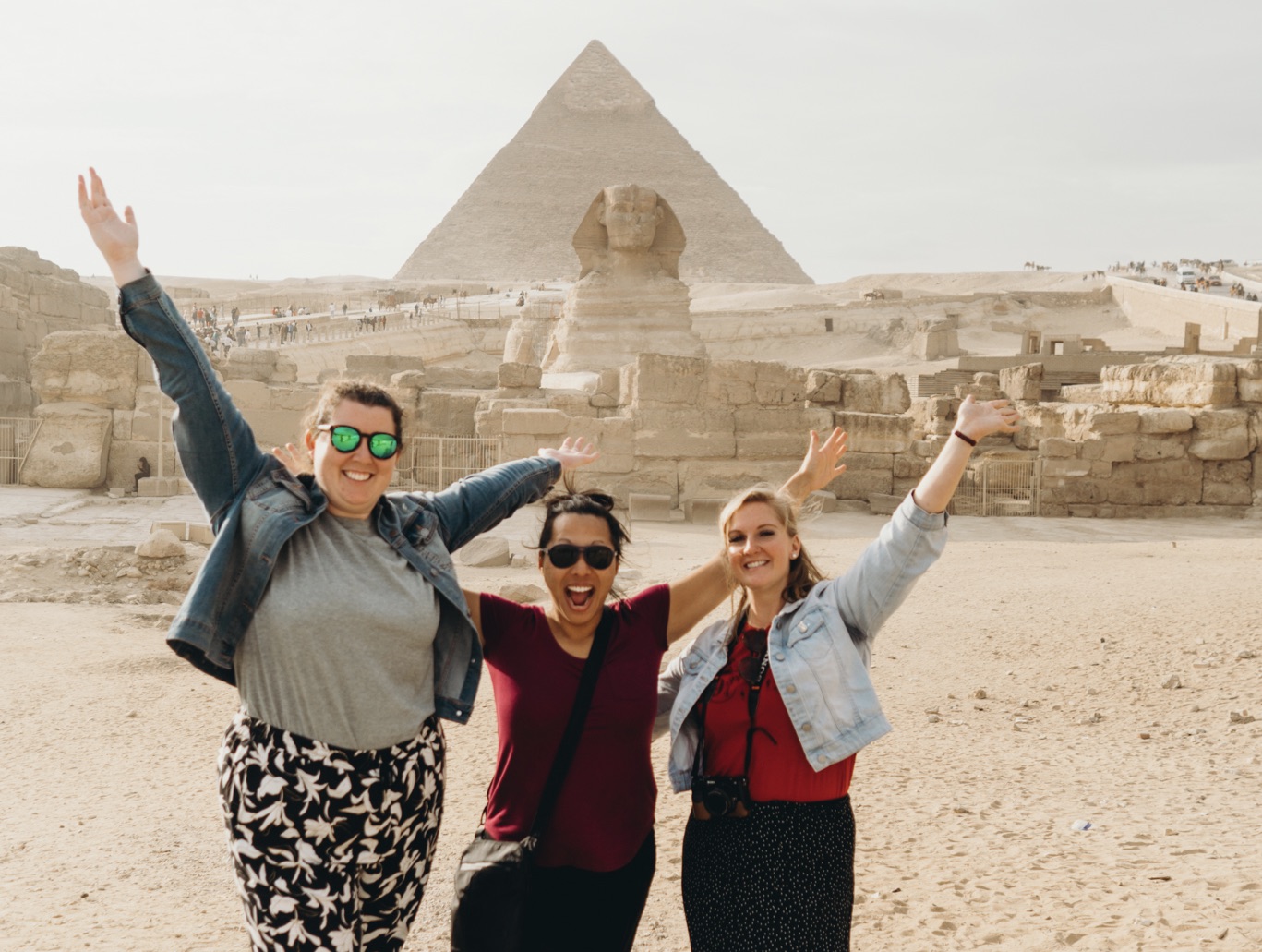 Women next to Pyramids
