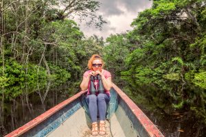 woman on boat in the amazon Ecuador