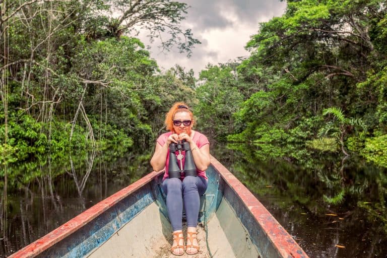 woman on boat in the amazon Ecuador