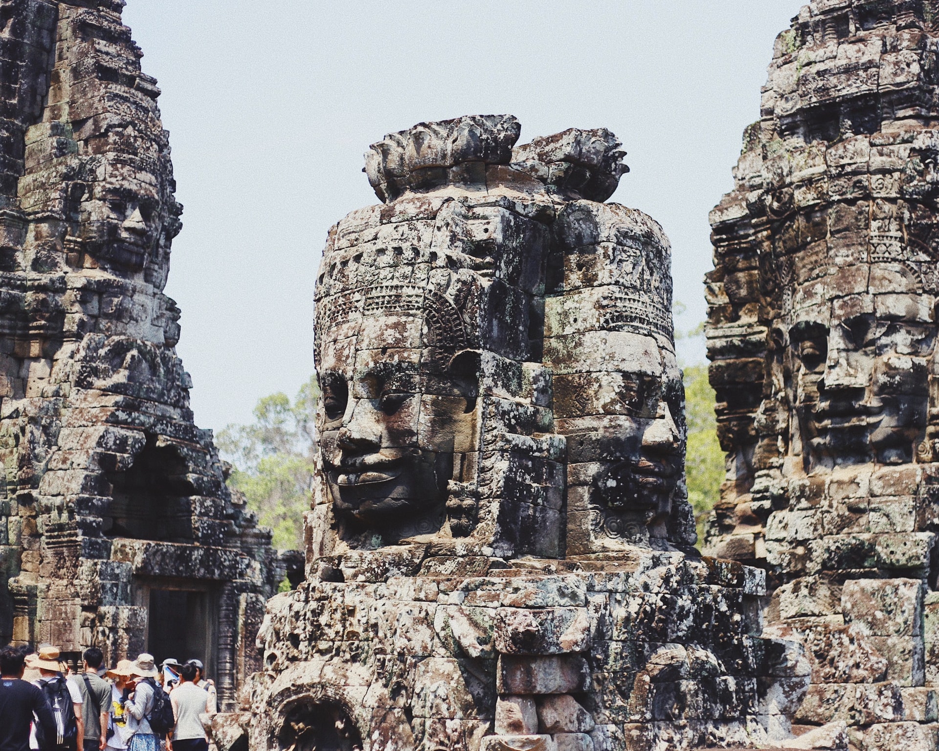Faces carved into the temple of Angkor Wat