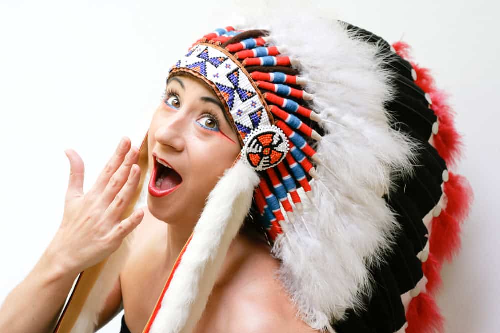 woman wearing Native American headl dress