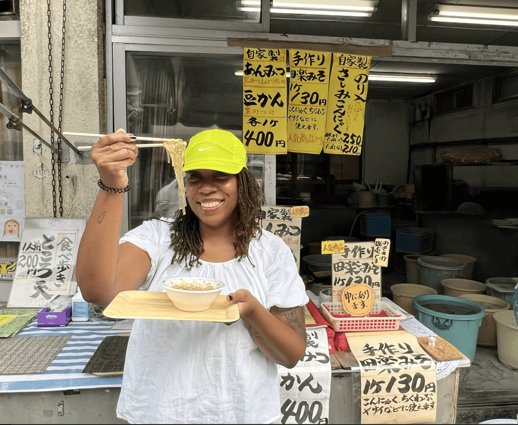 Japan food tour on women only tour girl eating noodles