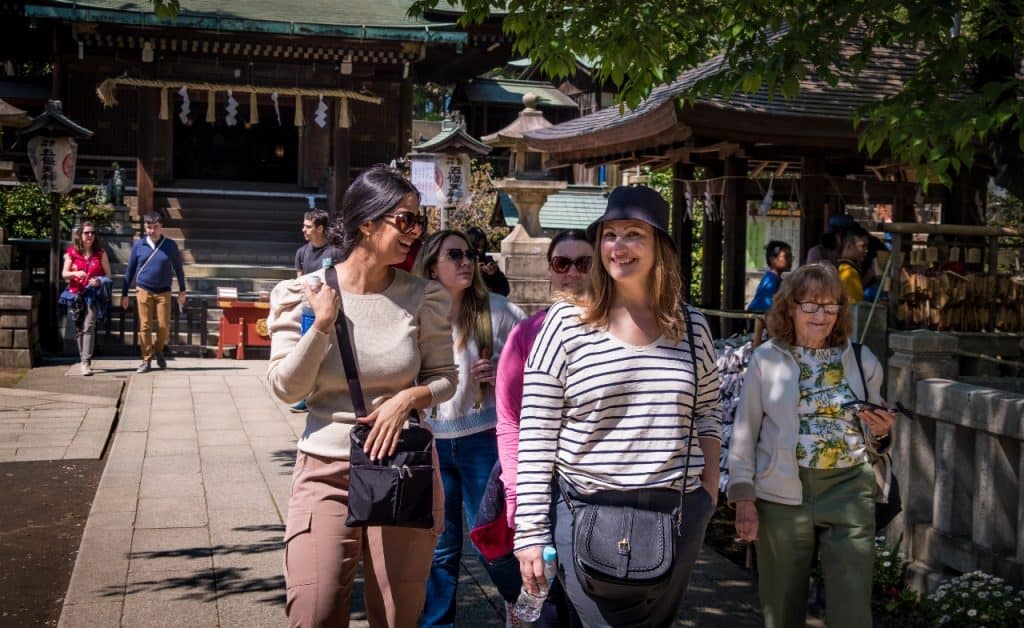 Japan tour for women walking through streets