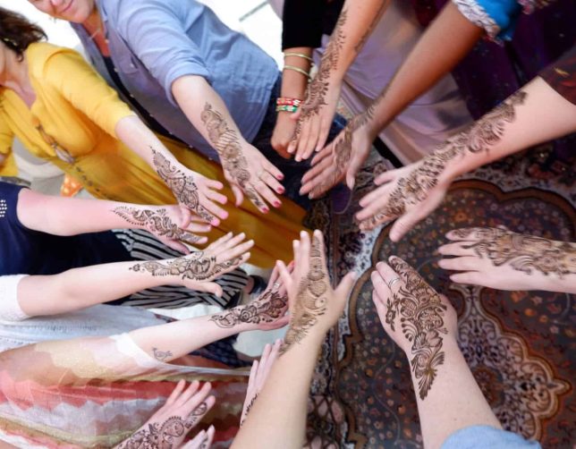 Hands with henna tattoos in India