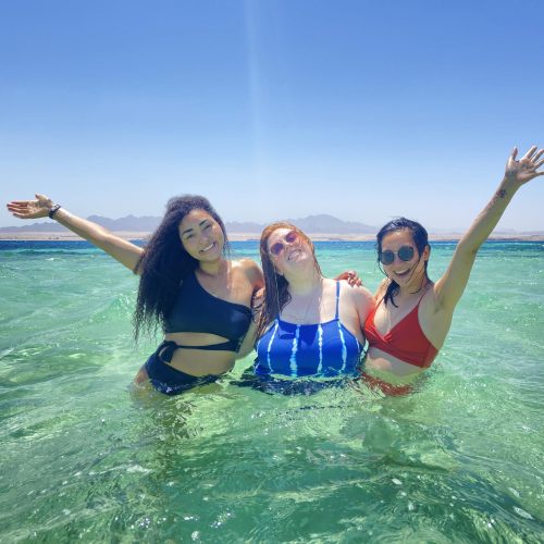 Women enjoying the ocean