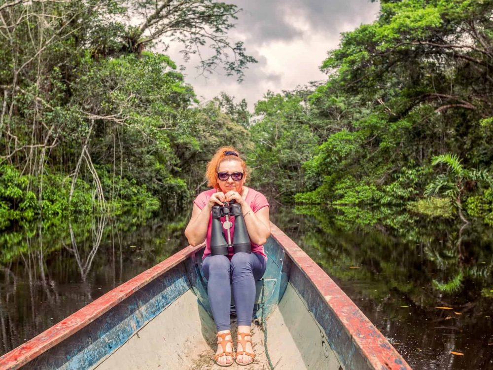 woman on boat in the amazon Ecuador