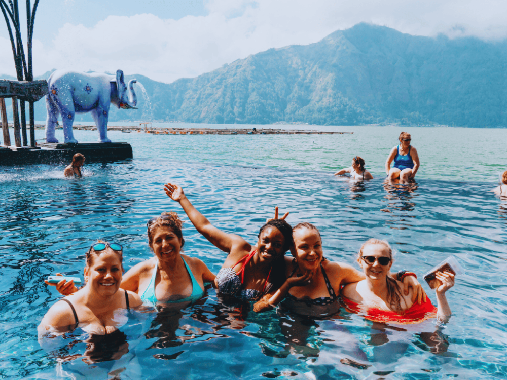 women in Bali swimming on women only tour