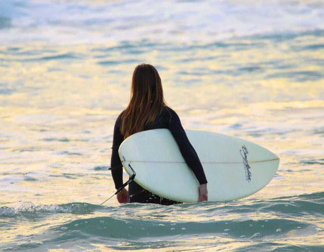 solo female traveling surfing in bali