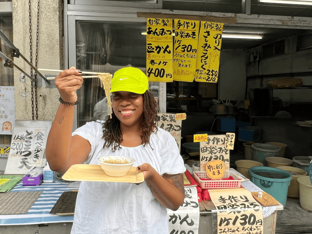 Japan food tour on women only tour girl eating noodles